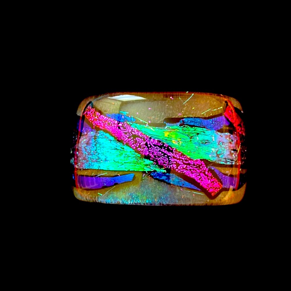 Selling the glass cuff with dichromatic pieces of foils. Pendant sold separately